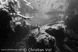 Woman Free Diving at Cenote Jardin del Eden, Quintana Roo... by Christian Vizl 